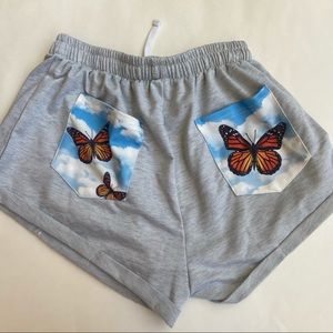 Gray lounge shorts with butterfly design